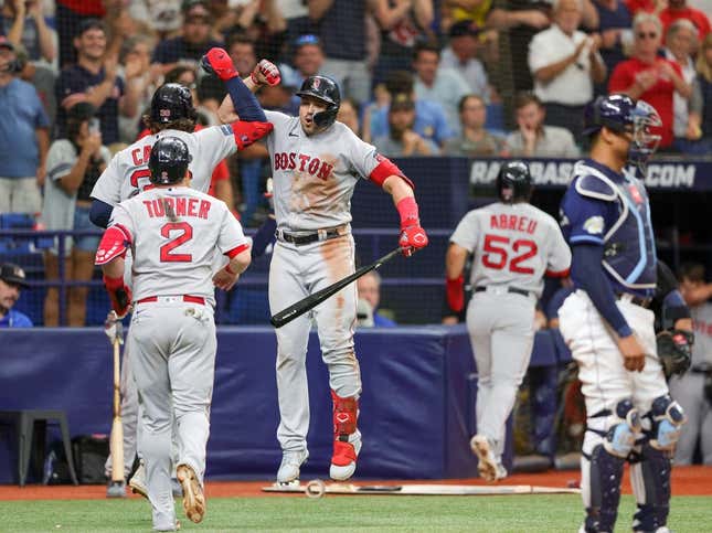 Sep 4, 2023; St. Petersburg, Florida, USA; Boston Red Sox right fielder Adam Duvall (18) congratulates first baseman Triston Casas (36) after hitting a there-run home run against the Tampa Bay Rays in the sixth inning at Tropicana Field.