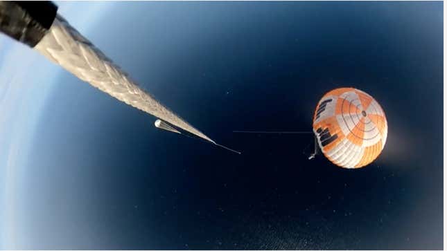 The rocket booster deployed a parachute to slow down its acceleration on its descent back to Earth.