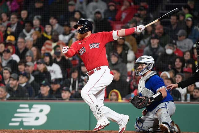 May 3, 2023; Boston, Massachusetts, USA; Boston Red Sox designated hitter Justin Turner (2) loads the bases against the Toronto Blue Jays during the fifth inning at Fenway Park.