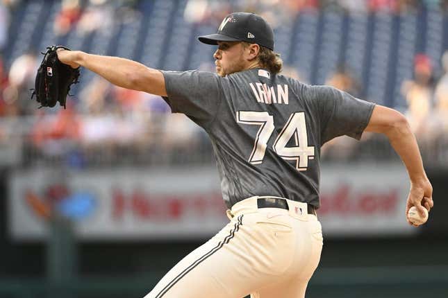 Jul 21, 2023; Washington, District of Columbia, USA; Washington Nationals starting pitcher Jake Irvin (74) throws to the San Francisco Giants during the first inning at Nationals Park.