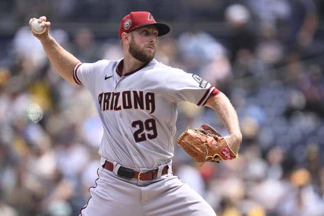 Aug 19, 2023; San Diego, California, USA; Arizona Diamondbacks starting pitcher Merrill Kelly (29) throws a pitch against the San Diego Padres during the first inning at Petco Park.