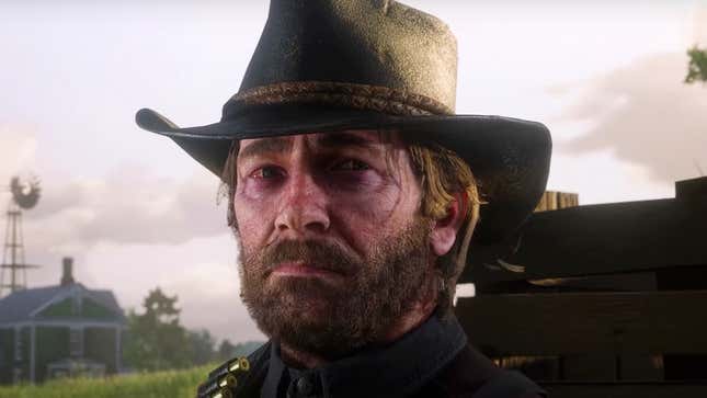 A screenshot shows a very sad cowboy as seen in RDR2. 