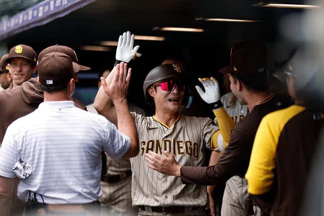 Aug 2, 2023; Denver, Colorado, USA; San Diego Padres third baseman Ha-Seong Kim (7) celebrates his solo home run in the first inning against the Colorado Rockies at Coors Field.