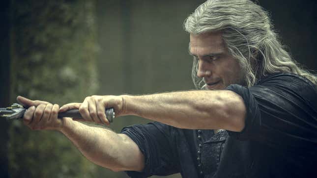 The Witcher still shows Geralt posing with his sword. 