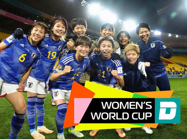 Japan celebrates after a 4-0 trouncing of Spain.