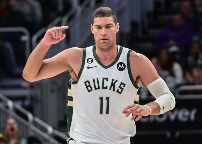 Mar 19, 2023; Milwaukee, Wisconsin, USA; Milwaukee Bucks center Brook Lopez (11) reacts after scoring a basket in the fourth quarter during game against the Toronto Raptors at Fiserv Forum.