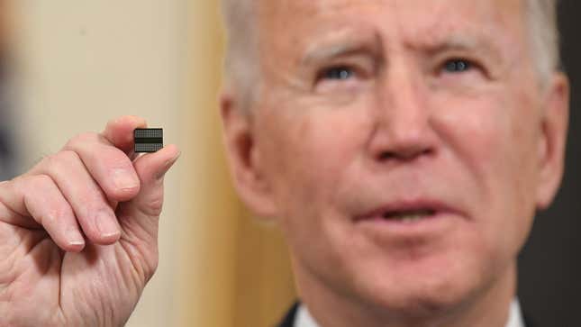 Biden holding microchip