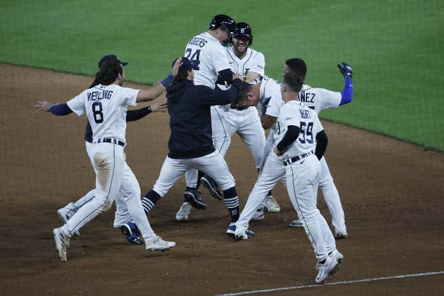 Jun 12, 2023; Detroit, Michigan, USA; Detroit Tigers first baseman Spencer Torkelson (20) celebrates with teammates after he hits an RBI walk off single tenth inning against the Atlanta Braves at Comerica Park.