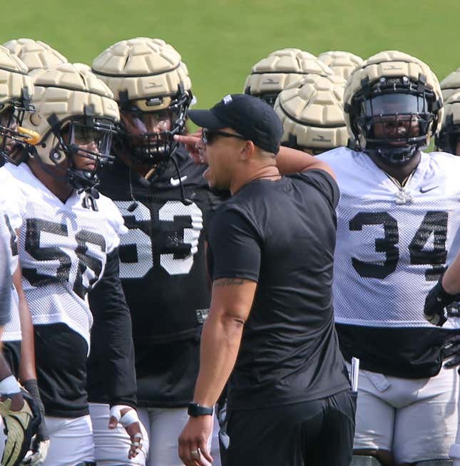 Purdue Boilermakers head coach Ryan Walters coaches players during Purdue football practice, Wednesday, August 2, 2023, at Purdue University in West Lafayette, Ind.