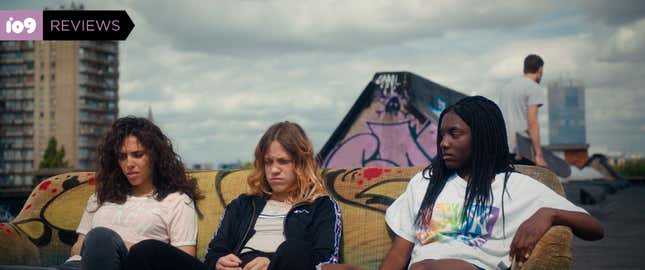 Morjana (Samarcande Saadi), Amélie (Mathilde Lamusse), and Bintou (Suzy Bemba) ponder their terrifying predicament while sitting on a couch on a rooftop.