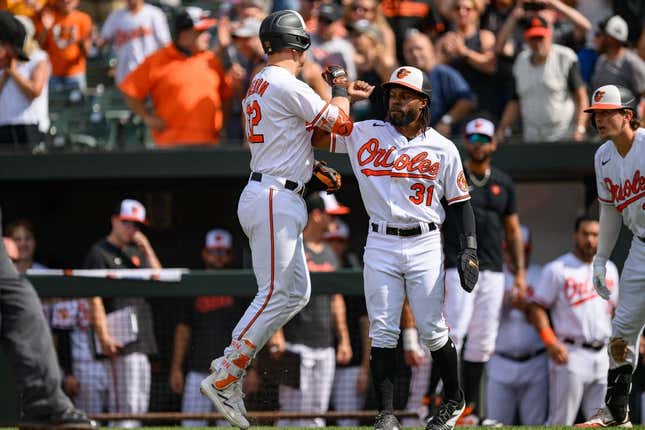 Aug 27, 2023; Baltimore, Maryland, USA; Baltimore Orioles first baseman Ryan O&#39;Hearn (32) celebrates with center fielder Cedric Mullins (31) after hitting a two run home run during the eighth inning against the Colorado Rockies at Oriole Park at Camden Yards.