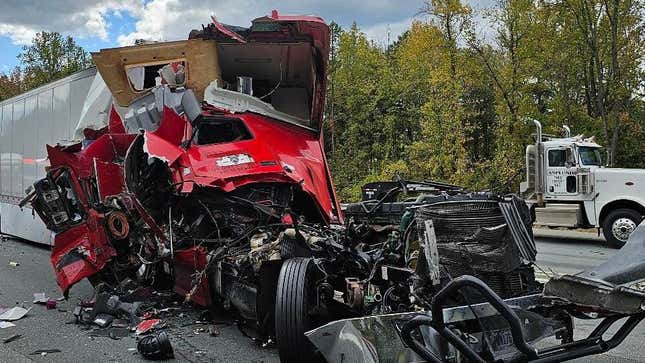 Image for article titled Truck Driver Somehow Walked Away Uninjured From This Massive Crash