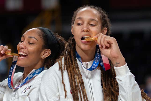 Brittney Griner #15 of the United States and A’ja Wilson (left) #9 of the United States with their gold medals at the medal presentation after the Japan V USA basketball final for women at the Saitama Super Arena during the Tokyo 2020 Summer Olympic Games on August 8, 2021 in Tokyo, Japan. 