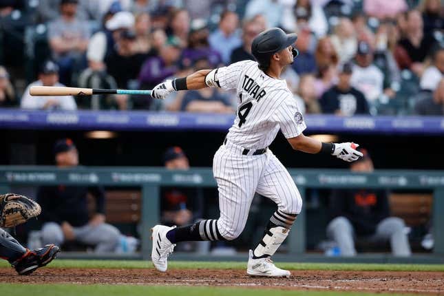Jun 30, 2023; Denver, Colorado, USA; Colorado Rockies shortstop Ezequiel Tovar (14) watches his ball on a three run home run in the sixth inning against the Detroit Tigers at Coors Field.