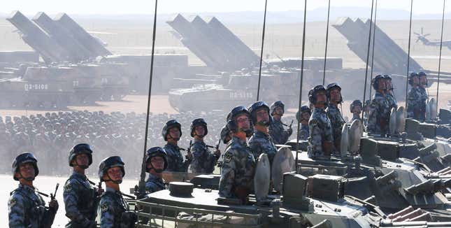 A picture released by Xinhua News Agency shows troops during a military parade celebrating the 90th anniversary of the founding of the Chinese People's Liberation Army (PLA) at Zhurihe training base in Inner Mongolia Autonomous Region, northern China, 30 July 2017. The 90th anniversary of the founding of the People's Liberation Army falls on 01 August 2017.