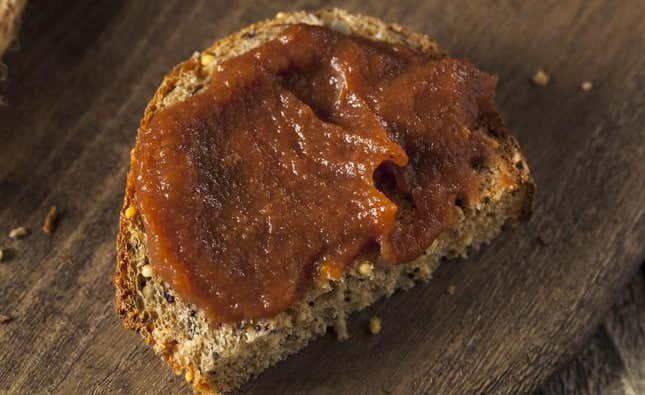 apple butter spread on slice of bread