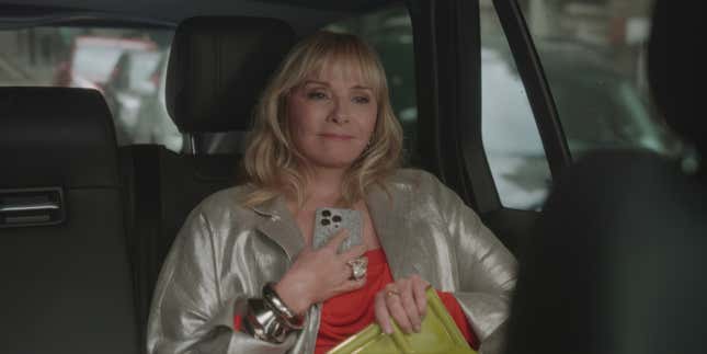 Kim Cattrall sits in the back of a car in And Just Like That...