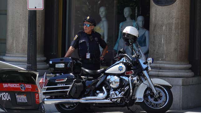 SAN FRANCISCO, CALIFORNIA - MAY 24: A San Francisco police officer looks on while patrolling Union Square on May 24, 2022 in San Francisco, California. 