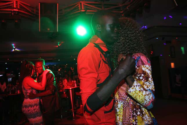 A couple dances at a "day club" in Juba, South Sudan.