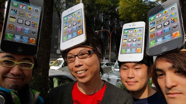 Apple fans outside a Softbank store in Tokyo. Softbank was the first carrier to bring the iPhone to Japan, and has a history of reinventing itself in order to get ahead of trends in technology.