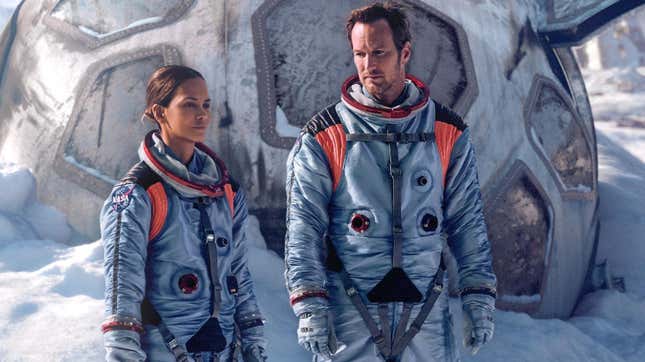 Halle Berry and Patrick Wilson dressed as their astronaut characters in Moonfall.