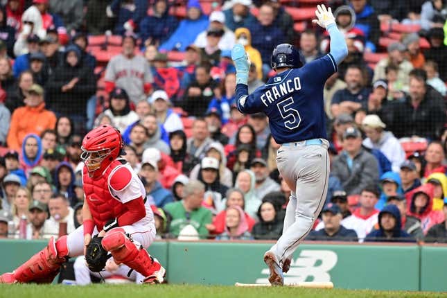 Jun 3, 2023; Boston, Massachusetts, USA; Tampa Bay Rays shortstop Wander Franco (5) scores a run against the Boston Red Sox during the fifth inning at Fenway Park.