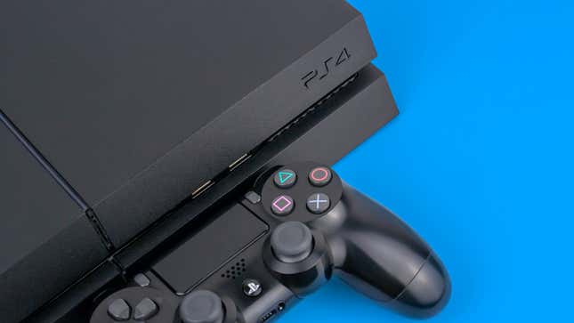 A PS4 sits against a blue background.