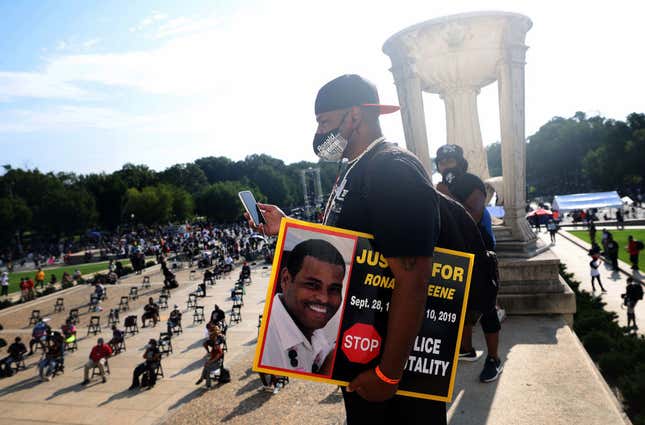 Sean Green, brother of Ronald Greene, listens to speakers at the Lincoln Memorial during the March on Washington August 28, 2020, in Washington, DC. Ronald Greene died in police custody following a high-speed chase in Louisiana in 2019