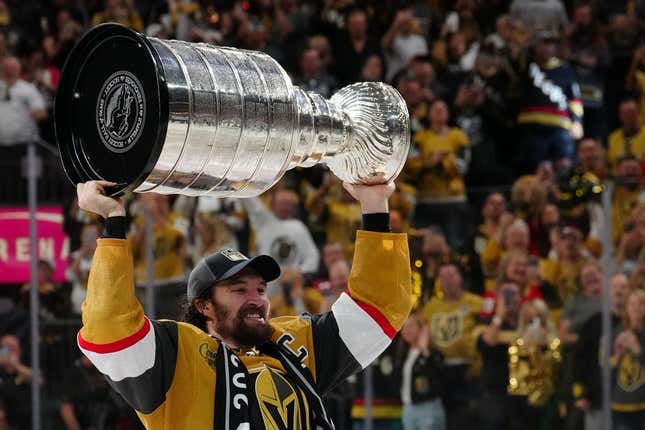 Jun 13, 2023; Las Vegas, Nevada, USA; Vegas Golden Knights forward Mark Stone (61) hoists the Stanley Cup after defeating the Florida Panthers in game five of the 2023 Stanley Cup Final at T-Mobile Arena.