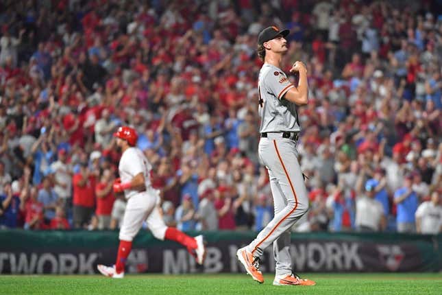 Aug 21, 2023; Philadelphia, Pennsylvania, USA; San Francisco Giants relief pitcher Sean Hjelle (64) reacts after allowing two-run home run to Philadelphia Phillies left fielder Kyle Schwarber (12) during the seventh inning at Citizens Bank Park.