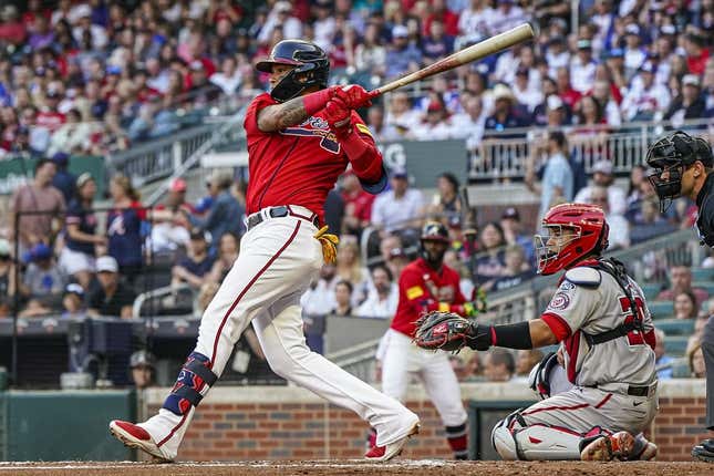 Jun 9, 2023; Cumberland, Georgia, USA; Atlanta Braves shortstop Orlando Arcia (11) grounds out to drive in a run against the Washington Nationals during the second inning at Truist Park.