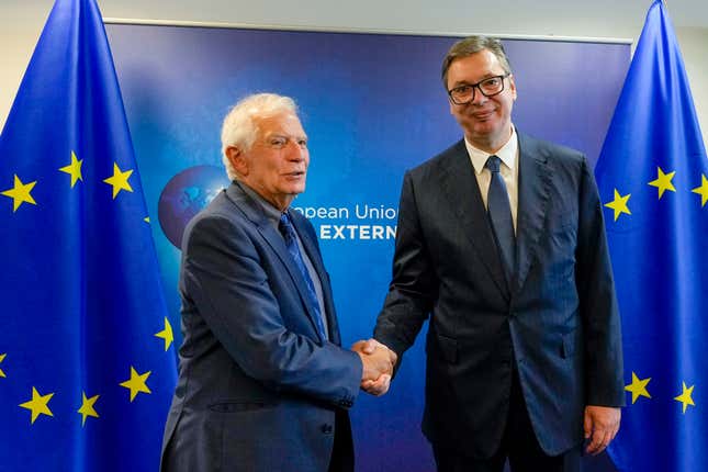 Serbia&#39;s President Aleksandar Vucic, right, shakes hands with European Union foreign policy chief Josep Borrell prior to a meeting in Brussels, Thursday, Sept. 14, 2023. The leaders of Serbia and Kosovo are holding a fresh round of meetings on Thursday aimed at improving their strained relations as calls mount for a change in the Western diplomatic approach toward them amid concern that their tensions could spiral out of control. (AP Photo/Virginia Mayo)
