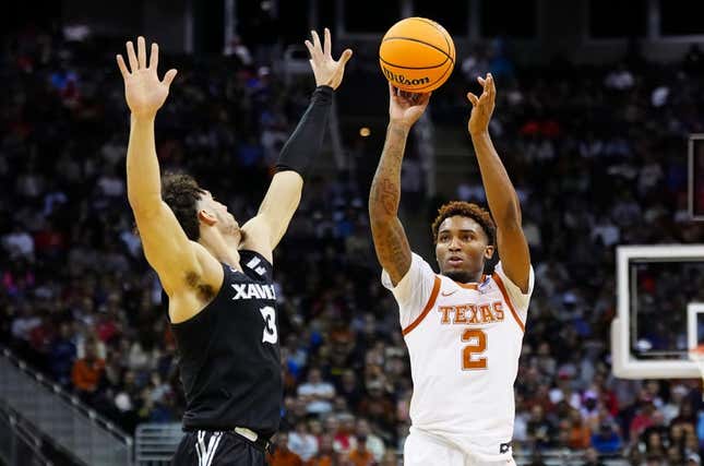 Mar 24, 2023; Kansas City, MO, USA; Texas Longhorns guard Arterio Morris (2) shoots against Xavier Musketeers guard Colby Jones (3) during the first half of an NCAA tournament Midwest Regional semifinal at T-Mobile Center.