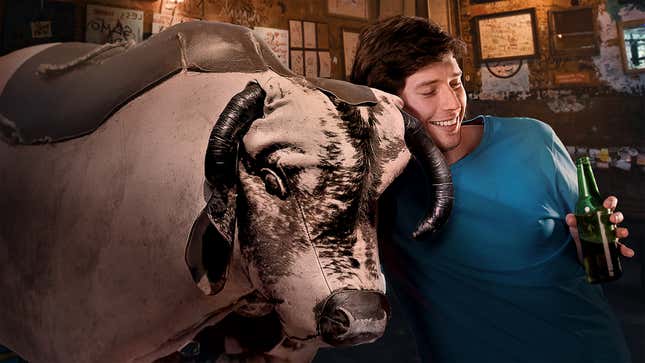 Image for article titled Drunk Man Attempts To Talk Some Sense Into Mechanical Bull