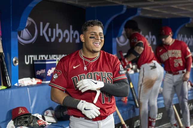 Jul 14, 2023; Toronto, Ontario, CAN; Arizona Diamondbacks catcher Gabriel Moreno (14) celebrates after hitting a home run against the Toronto Blue Jays during the seventh inning at Rogers Centre.