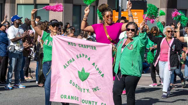 Members of the Alpha Kappa Alpha Sorority, Inc. of Orange County wave to parade goers along Anaheim Boulevard during the 43rd annual Orange County Black History Parade &amp; Unity Fair on Saturday, February 4, 2023 in Anaheim.