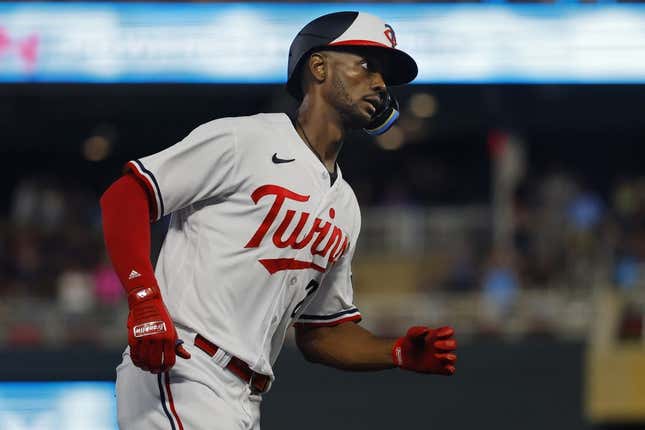 Aug 4, 2023; Minneapolis, Minnesota, USA; Minnesota Twins center fielder Michael A. Taylor (2) runs the bases on his solo home run against the Arizona Diamondbacks in the seventh inning at Target Field.