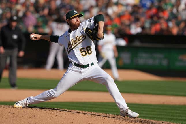 Aug 5, 2023; Oakland, California, USA; Oakland Athletics starting pitcher Paul Blackburn (58) throws a pitch against the San Francisco Giants during the sixth inning at Oakland-Alameda County Coliseum.