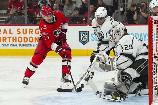 Jan 31, 2023; Raleigh, North Carolina, USA; Los Angeles Kings goaltender Pheonix Copley (29) and center Anze Kopitar (11) stop the shot attempt by Carolina Hurricanes right wing Jesper Fast (71) during the first period at PNC Arena.