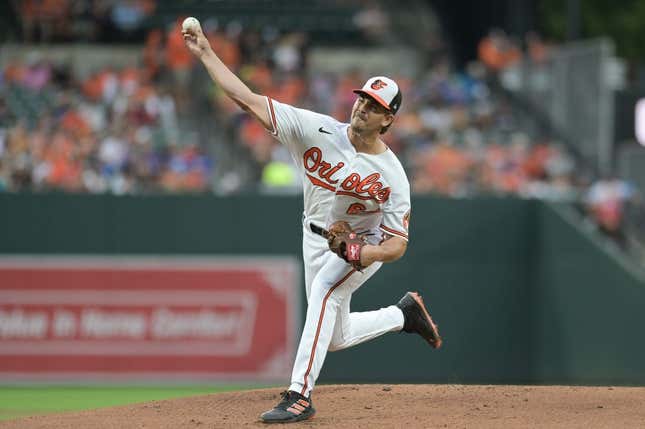 Aug 23, 2023; Baltimore, Maryland, USA;  Baltimore Orioles starting pitcher Dean Kremer (64) throws a first inning pitch against the Toronto Blue Jays at Oriole Park at Camden Yards.