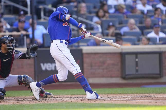 Sep 14, 2023; New York City, New York, USA; New York Mets center fielder Brandon Nimmo (9) hits an RBI double against the Arizona Diamondbacks during the third inning at Citi Field.