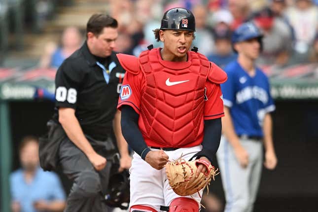 Jul 8, 2023; Cleveland, Ohio, USA; Cleveland Guardians catcher Bo Naylor (23) reacts after tagging out Kansas City Royals second baseman Nicky Lopez (not pictured) during the eighth inning at Progressive Field.