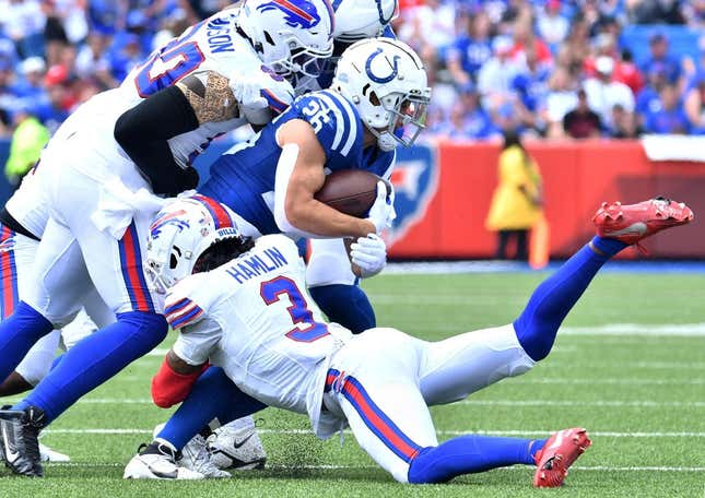 Aug 12, 2023; Orchard Park, New York, USA; Buffalo Bills safety Damar Hamlin (3) makes a tackle against Indianapolis Colts running back Evan Hull (26) in the first quarter of a pre-season game at Highmark Stadium.
