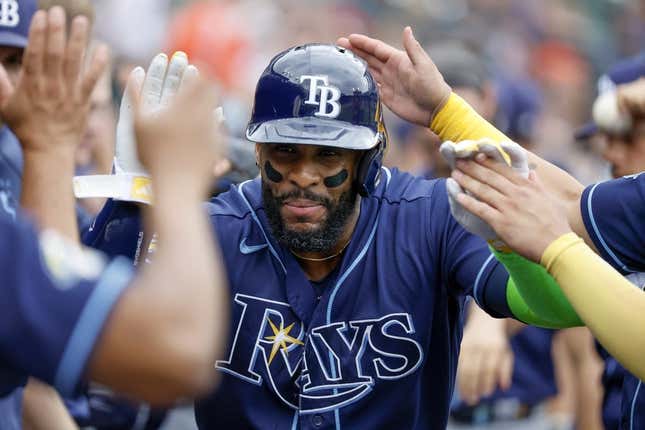 Aug 6, 2023; Detroit, Michigan, USA; Tampa Bay Rays first baseman Yandy Diaz (2) receives congratulations from teammates after he hits a two run home run in the second inning against the Detroit Tigers at Comerica Park.