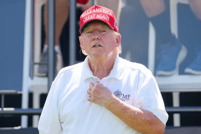 Former President Donald Trump looks on at hole one prior to the start of day three of the LIV Golf Invitational - Bedminster at Trump National Golf Club on August 13, 2023 in Bedminster, New Jersey.