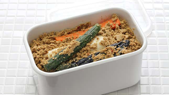 Image for article titled Make Superb Pickles by Burying Them in Rice Bran