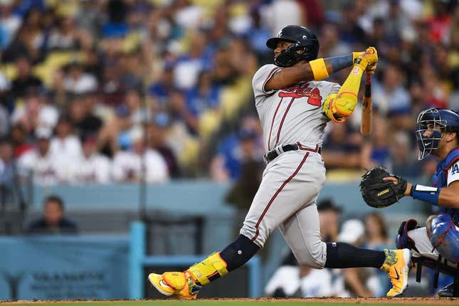 Sep 2, 2023; Los Angeles, California, USA; Atlanta Braves right fielder Ronald Acuna Jr. (13) hits a home run against the Los Angeles Dodgers during the third inning at Dodger Stadium.