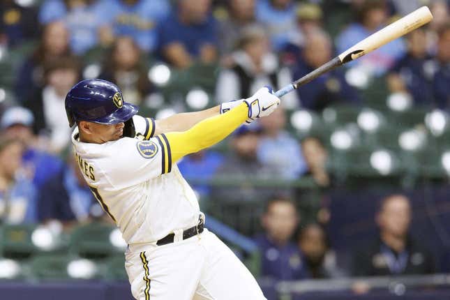 Sep 11, 2023; Milwaukee, Wisconsin, USA;  Milwaukee Brewers shortstop Willy Adames (27) hits an RBI double during the third inning against the Miami Marlins at American Family Field.