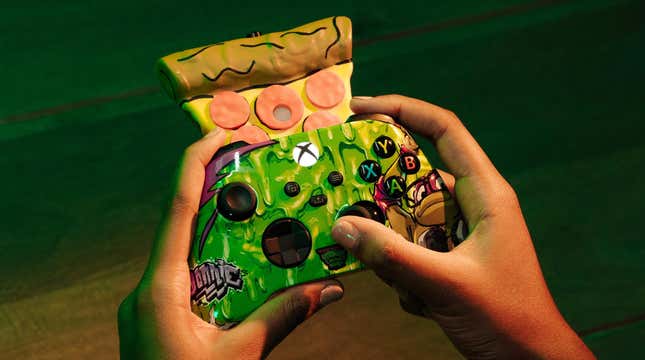 Xbox controller themed with Donatello that comes with a large, pizza shaped scent diffuser.