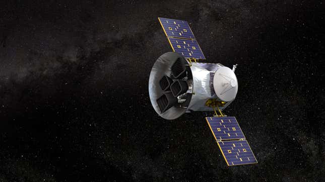 An artist's rendering of the TESS instrument in space. The object is a silver cylinder with panels extending on either side of it.